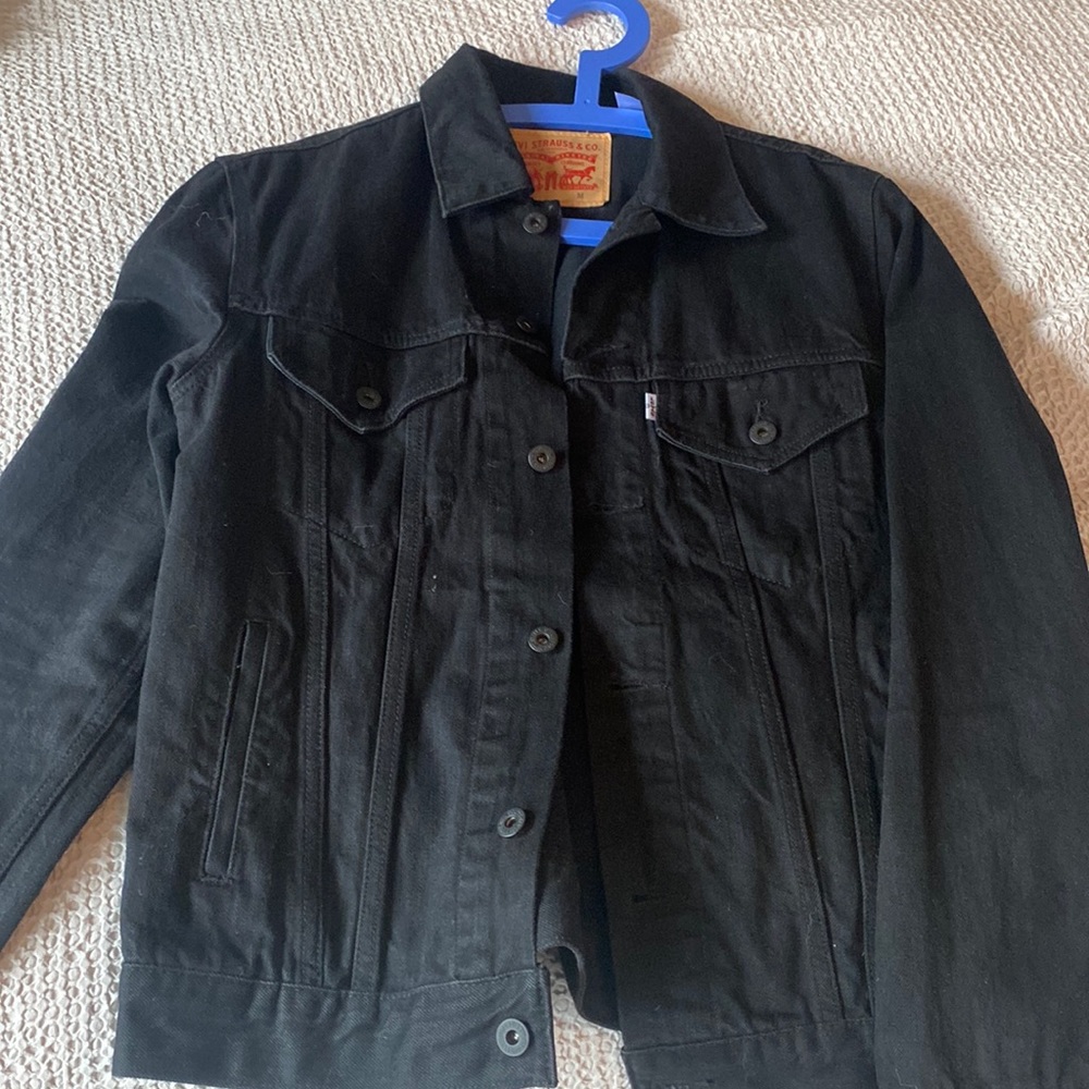 Levi’s black denim trucker jacket